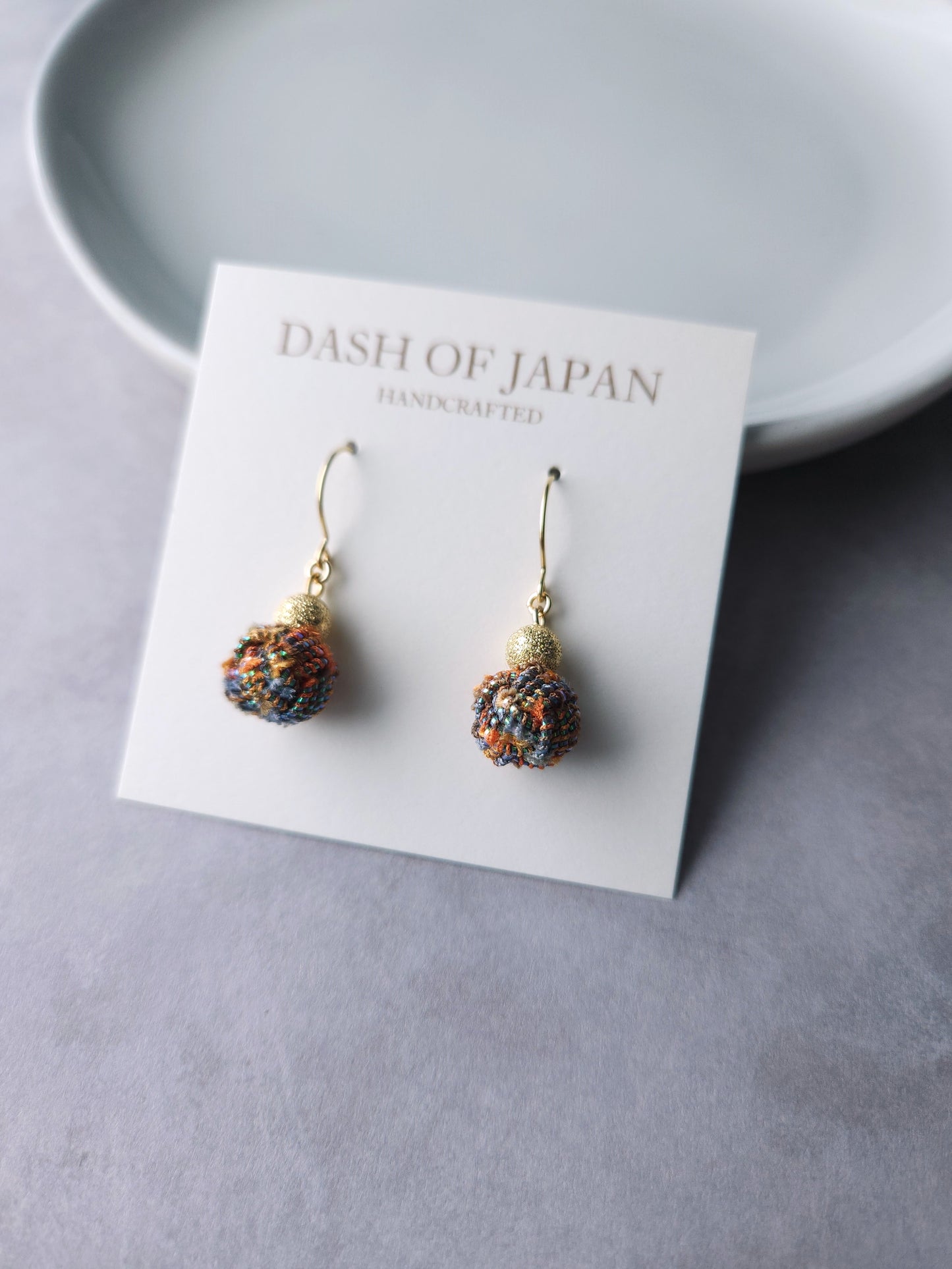 Pom Pom -Tweed Green Orange